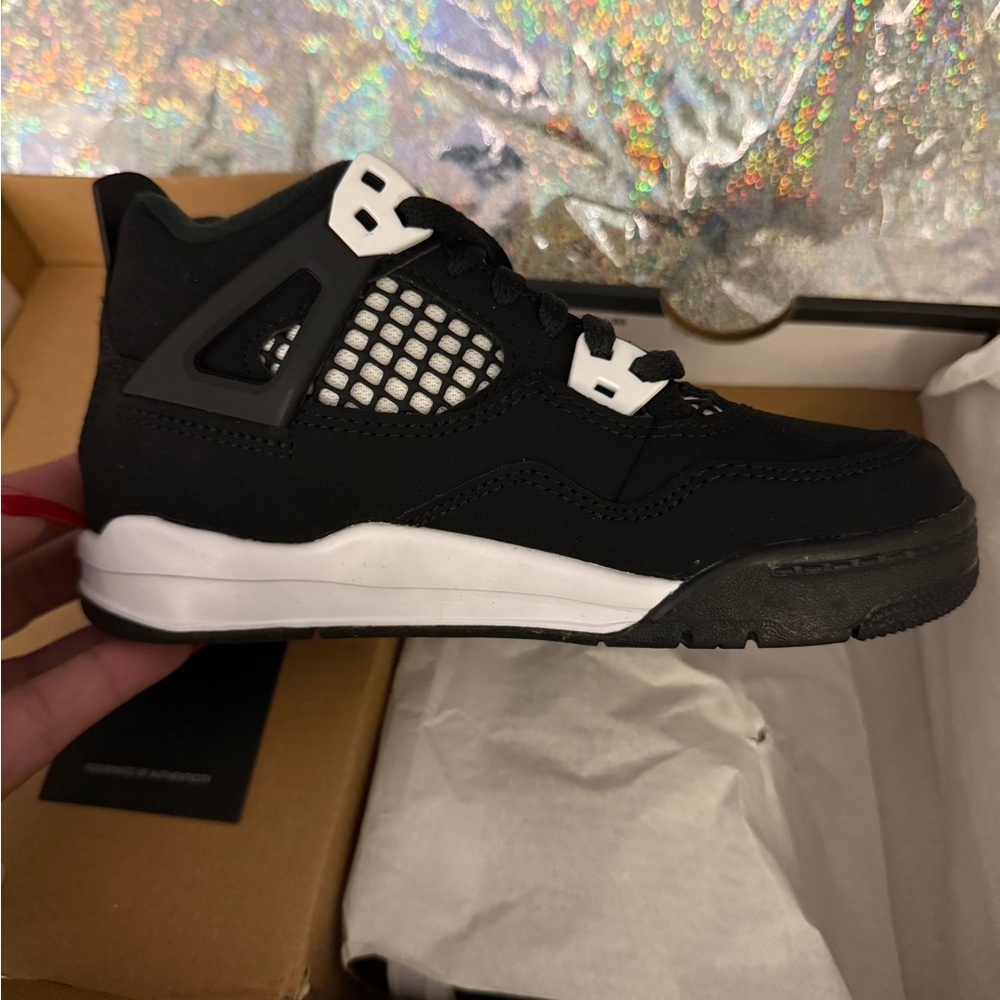 Jordan’s size 11c. I bought children’s instead of men’s. 
Never worn